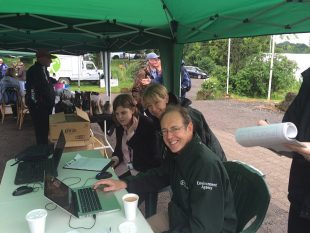 Environment Agency CEO Sir James Bevan testing a pilot version of the 'I want to Fish' digital service