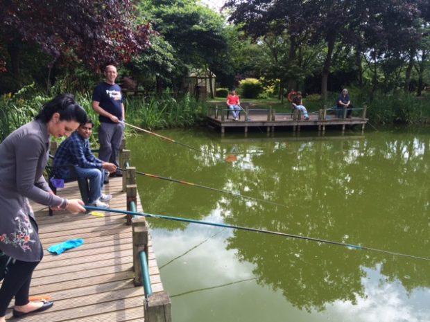 Members of the rod licence team on a fishing trip to learn more about users