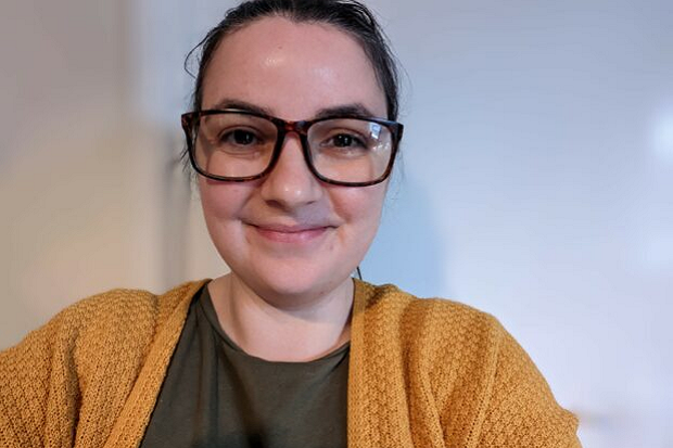 Photo of Fran Redman' to 'A girl, with dark hair, tied back, and wearing glasses, a mustard coloured cardigan and a dark green t shirt