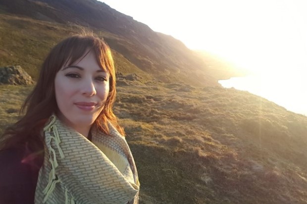 Photo of Sue Agnew with mountains in the background