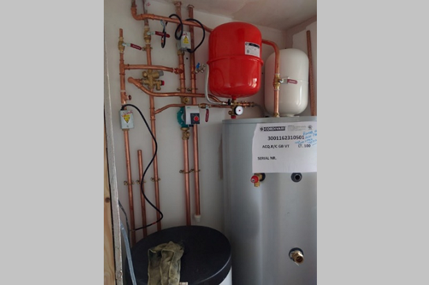 A heating boiler and piping system