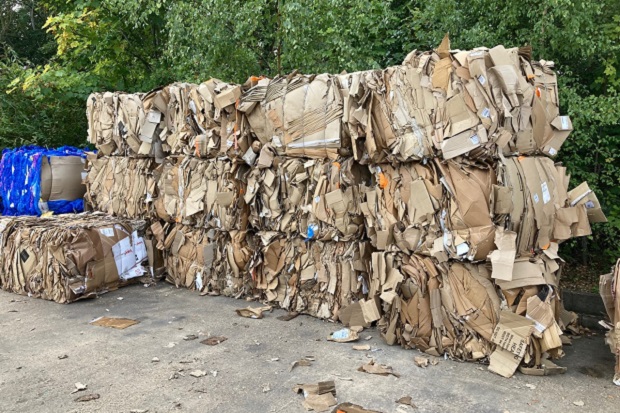 Bales of cardboard, stacked on top of each other