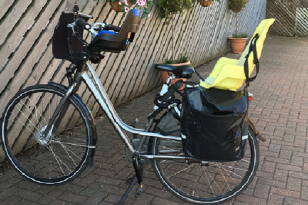 A bicycle with a child seat