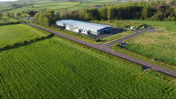 an aerial view of a farm and a road Data Centre in Coleraine